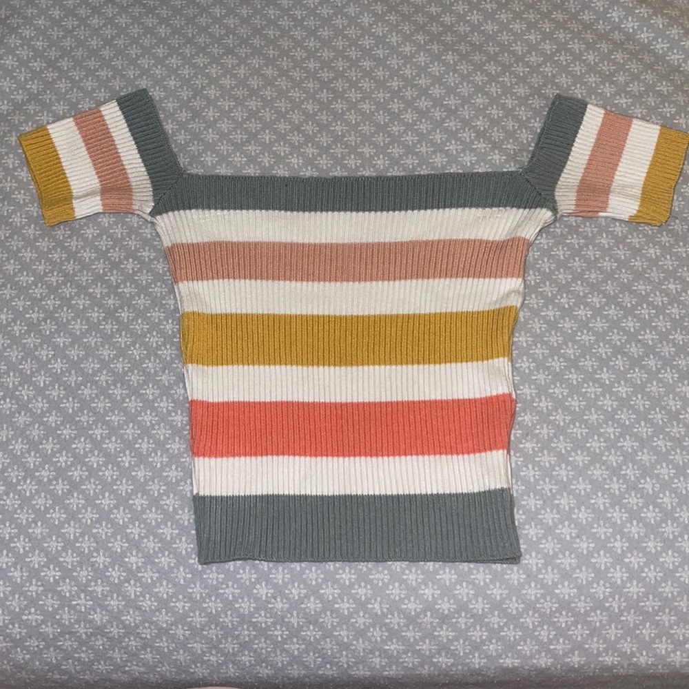 Brand is Debut. Size is M/L but fits more like an XS/S.